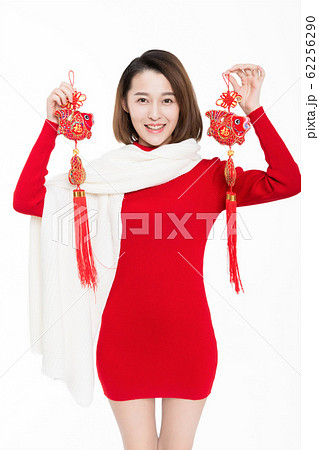 pretty girl holding chinese new year decoration 62256290
