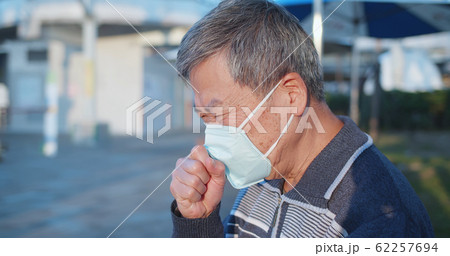 elder coughs and wears mask elder coughs and wears mask 62257694