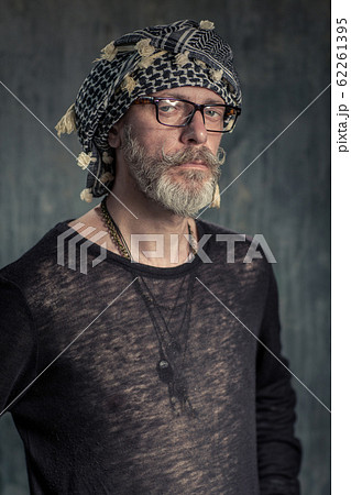 Old fashion man, good looking. Egyptian scarf and glasses Old fashion man, good looking. Egyptian scarf and glasses 62261395
