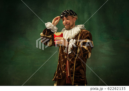 Medieval young man in old-fashioned costume 62262135