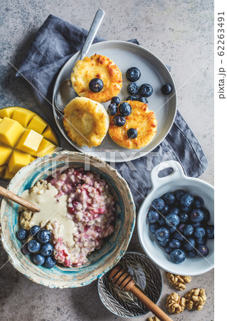 Breakfast background. Oatmeal, cottage cheese pancakes Breakfast background. Oatmeal, cottage cheese pancakes 62263491
