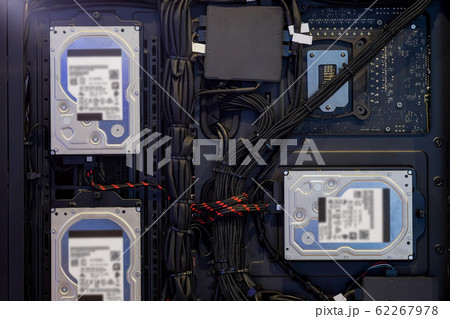 Close-up 3.5-inch Hard Disk Drive that installed for storage data and cable wire is neatly stored on back view of computer PC case, inside and D.I.Y. Computer PC technic 62267978