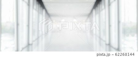 Wide White Gray Blurred Empty Abstract Corridor Pathway Background From Perspective Building Hallway for useus way to business success or technology banner background design Wide White Gray Blurred Empty Abstract Corridor Pathway Background From Perspective Building Hallway for useus way to business success or technology banner background design 62268144