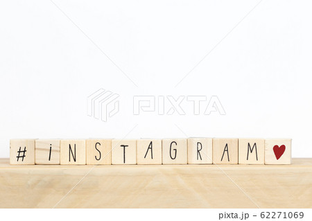 Wooden cubes with a hashtag and the word instagram, social media concept background Wooden cubes with a hashtag and the word instagram, social media concept background 62271069