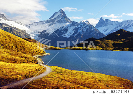 Picturesque view on Bachalpsee lake in Swiss Alps mountains Picturesque view on Bachalpsee lake in Swiss Alps mountains 62271443