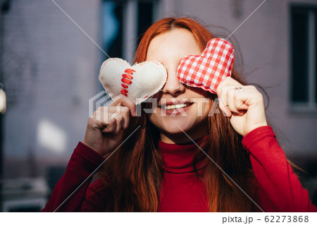 Valentine's Day. Pretty girl with heart symbols 62273868