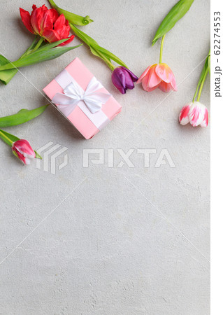 Spring creative holiday present with floral decor 62274553