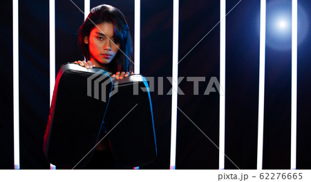 Girl exercises in Modern Neon Boxing Gym heavily Girl exercises in Modern Neon Boxing Gym heavily 62276665