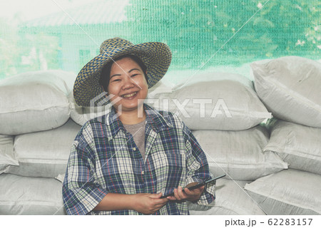 Smart farmer agriculturist with Organic Fertilizer 62283157