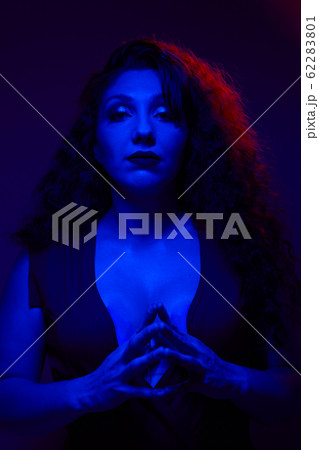 Young woman with closed eyes in studio Young woman with closed eyes in studio 62283801