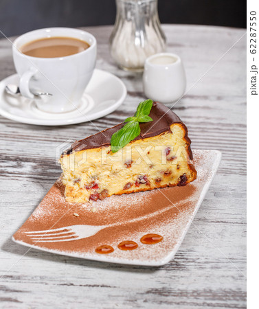 An original dish with a cup of coffee 62287550