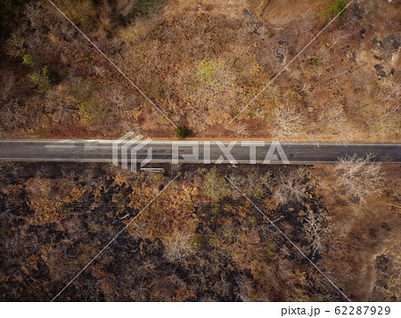 Aerial view, The road passes through a dry 62287929