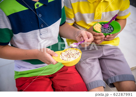 Close-up ice cream two kid hands. Tasty summer 62287991