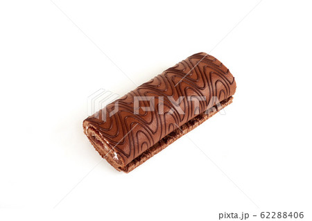 Chocolate biscuit roll cake isolated on white background. Chocolate biscuit roll cake isolated on white background. 62288406
