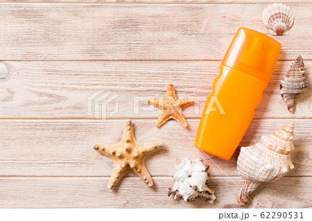 Top view of sunscreen bottle with starfish on 62290531
