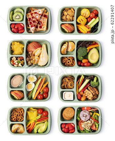 Lunch box with delicious food on a white Lunch box with delicious food on a white 62291407