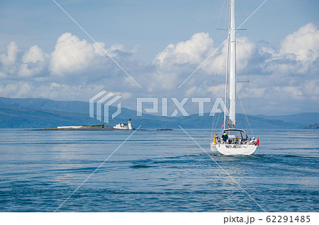 Sailing yacht cruising at Hebrides islands 62291485