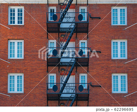 Brick facade with black steel emergency staircase Brick facade with black steel emergency staircase 62296695