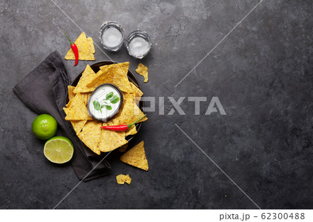 Mexican nachos chips and tequila 62300488