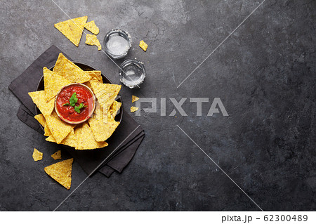 Mexican nachos chips and tequila 62300489