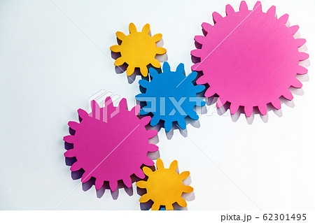 Multi-colored cogwheels on the background 62301495