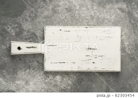 white cutting board on a gray with copy space white cutting board on a gray with copy space 62303454