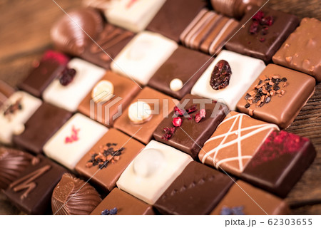Assorted chocolate pralines on the wooden 62303655