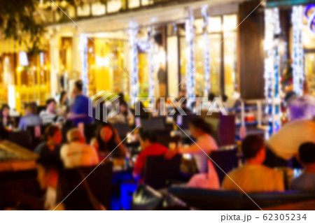 blurred image Lots of people enjoy at the bar pub blurred image Lots of people enjoy at the bar pub 62305234