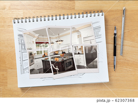 Sketch Pad with Drawing and Photos Resting On Wood Table Sketch Pad with Drawing and Photos Resting On Wood Table 62307368