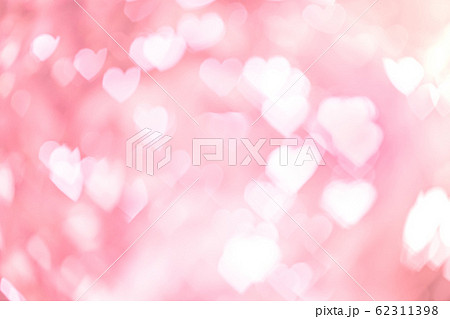 Heart shaped bokeh pink background Heart shaped bokeh pink background 62311398