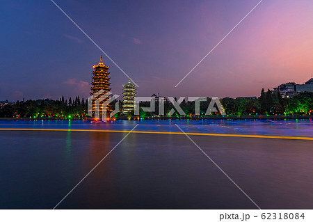 Sun and moon pagodas in Guilin at night 62318084