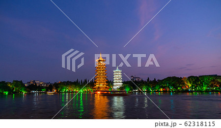 Sun and moon pagodas in Guilin at night Sun and moon pagodas in Guilin at night 62318115