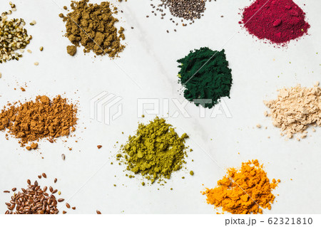 Top view various dietary supplements scattered on the table 62321810