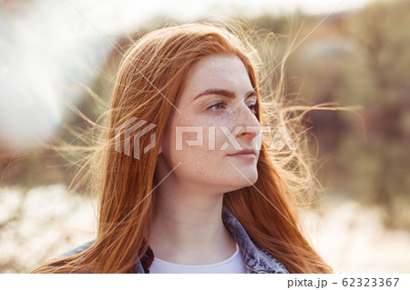 Girl with freckles 62323367