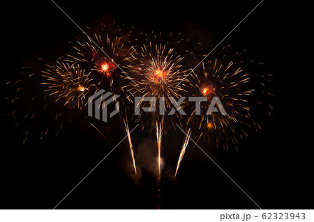 Colored firework background with free space for text. Colorful fireworks at night light up the sky. 62323943