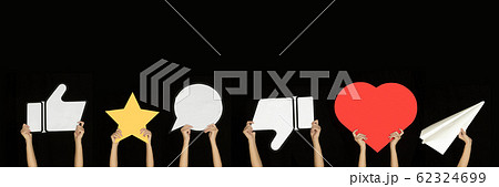 Hands holding the signs of social media on black studio background, flyer Hands holding the signs of social media on black studio background, flyer 62324699