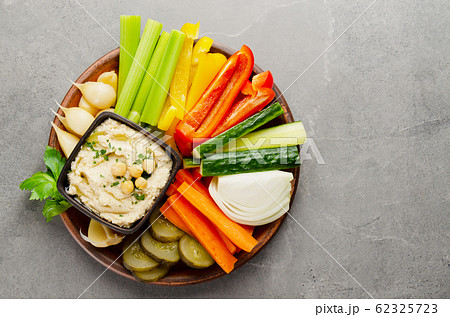 Flat lay view at vegetable Hummus dip dish topped Flat lay view at vegetable Hummus dip dish topped 62325723