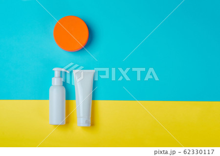 Sunprotection products, sanscreen. Minimal concept of summer vacation, tanning. Natural cosmetics, cream with SPF 62330117