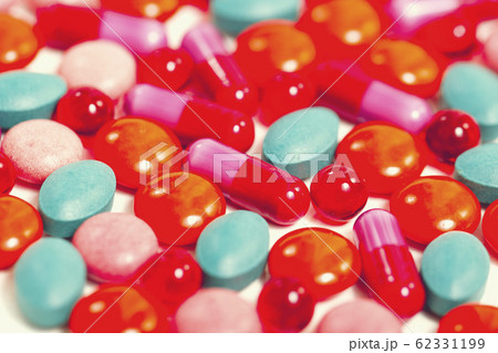 Different colorful pills background Different colorful pills background 62331199