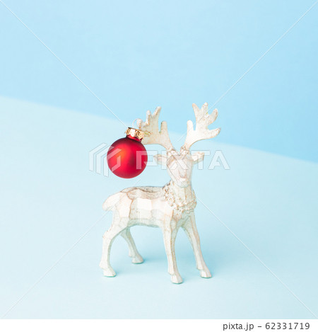 Christmas reindeer decorated like a New Year tree. 62331719