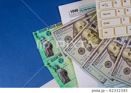 IRS 1040 tax return form with currency US dollar 62332385