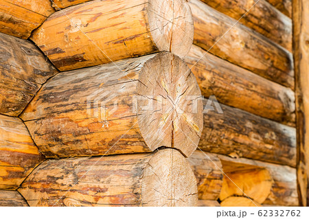 the corner of the house is made of large pine logs 62332762