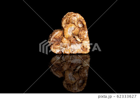 Cereal cocoa heart isolated on black glass Cereal cocoa heart isolated on black glass 62333627