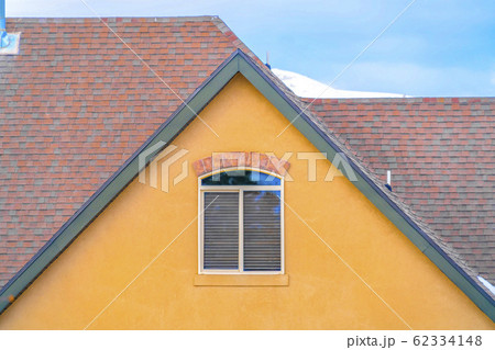 Close up of exterior of a home with blue sky in 62334148