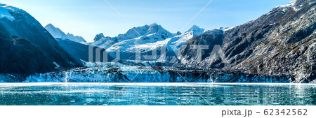 Panoramic view in Glacier Bay from cruise ship cruising towards Johns Hopkins Glacier in summer in Alaska, USA. Banner panorama crop Panoramic view in Glacier Bay from cruise ship cruising towards Johns Hopkins Glacier in summer in Alaska, USA. Banner panorama crop 62342562