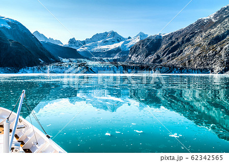 Cruise ship in Glacier Bay cruising towards Johns Hopkins Glacier in Alaska, USA. Panoramic view during summer Cruise ship in Glacier Bay cruising towards Johns Hopkins Glacier in Alaska, USA. Panoramic view during summer 62342565