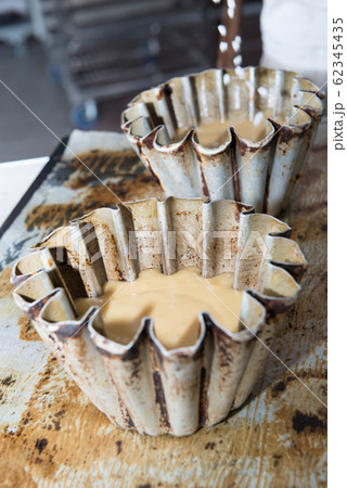 cooking brioches at the pastrycook cooking brioches at the pastrycook 62345435