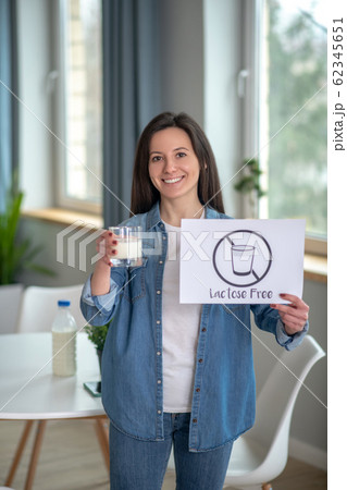 Woman going for lactose free milk products 62345651