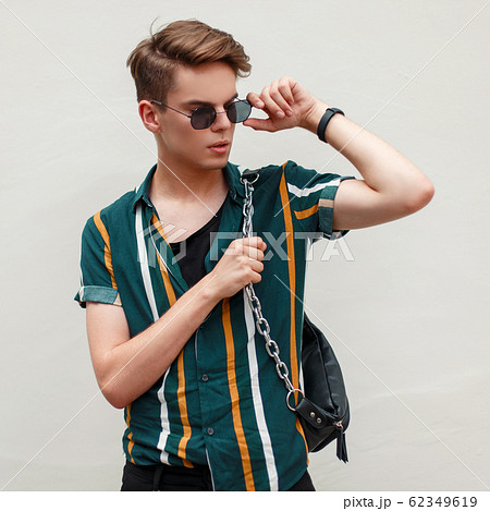 Handsome guy with sunglasses Handsome guy with sunglasses 62349619