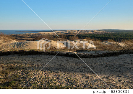 Sunset view of nordic dunes, early spring at Curonian spit, Nida, Klaipeda, Lithuania 62350335